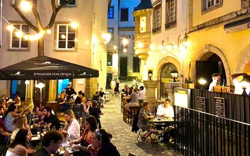 Dipso's terrace on a lively summer evening in Luxembourg's Old Town